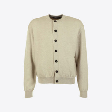 Cardigan beige knoop